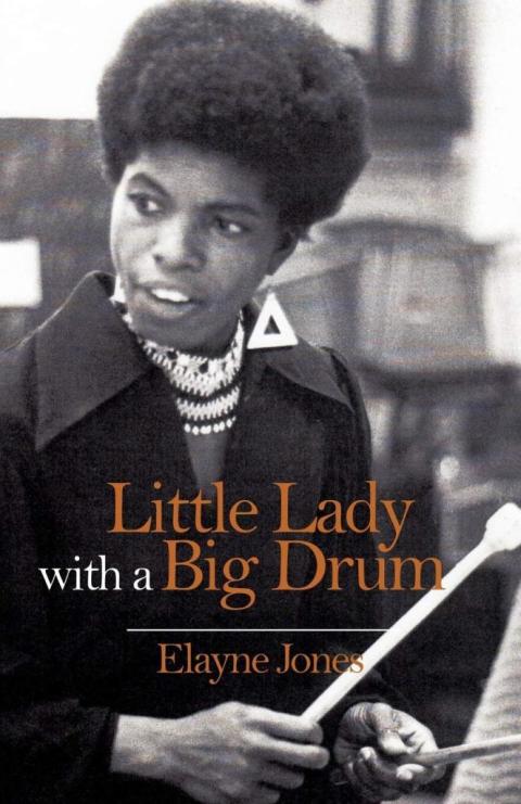 Percussionist Elayne Jones playing timpani on the cover of her new book Little Lady with a Big Drum