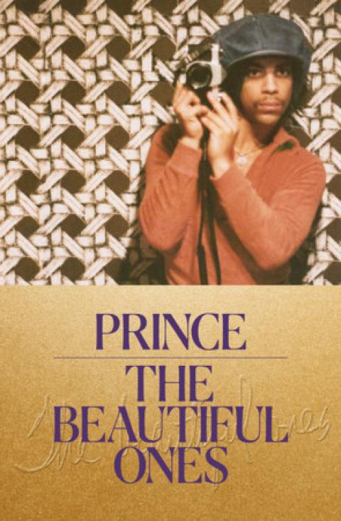 Prince in a black hat and orange shirt holding a camera above purple text over gold background which reads, Prince, The Beautiful Ones 